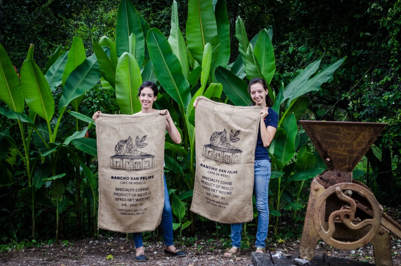 Melisa and Jimena at Rancho San Felipe with jute coffee sacks